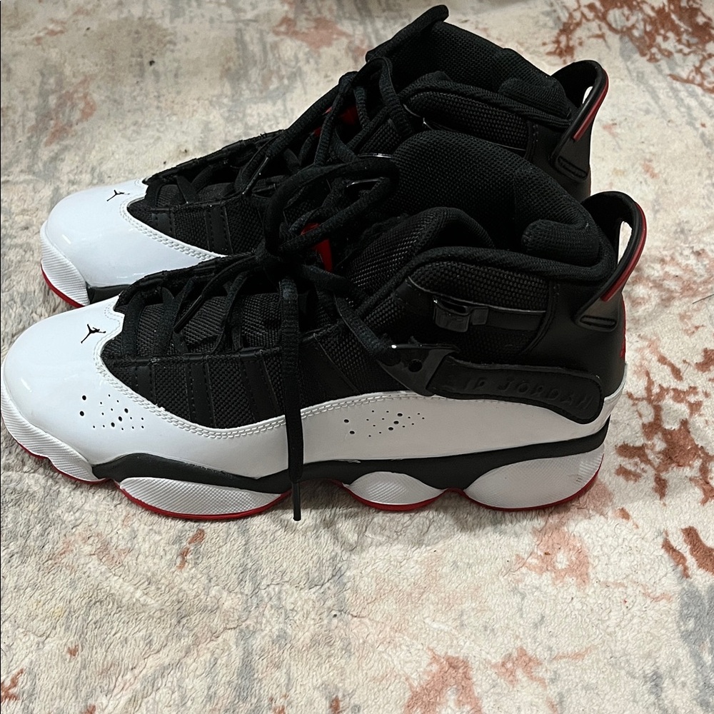 Jordan Kids Black and White Sneakers with Red Accents